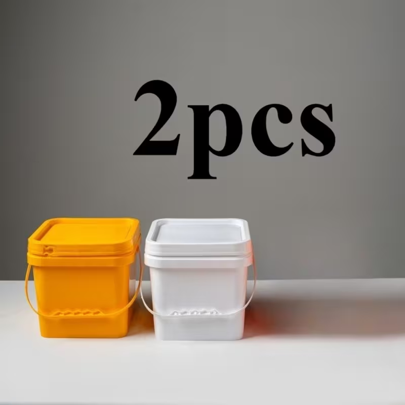 Two plastic buckets, square cleaning buckets, practical small buckets with handles.