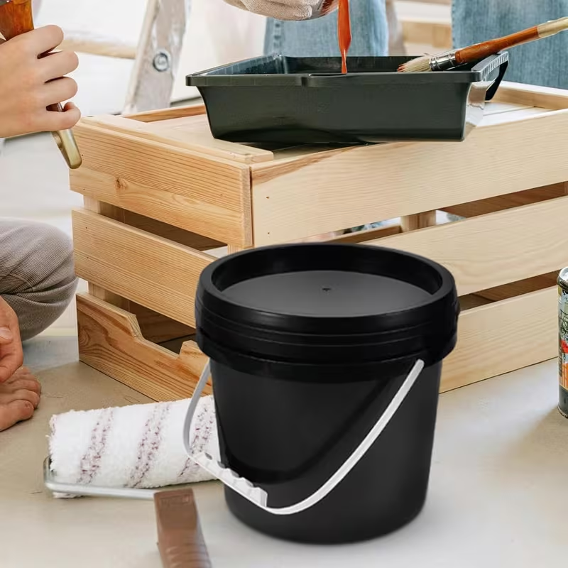 1.06-gallon black plastic bucket with handle and lid