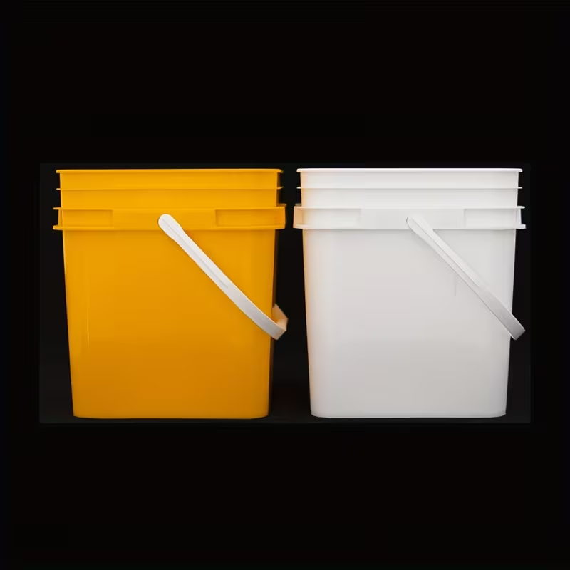 Two plastic buckets, square cleaning buckets, practical small buckets with handles.