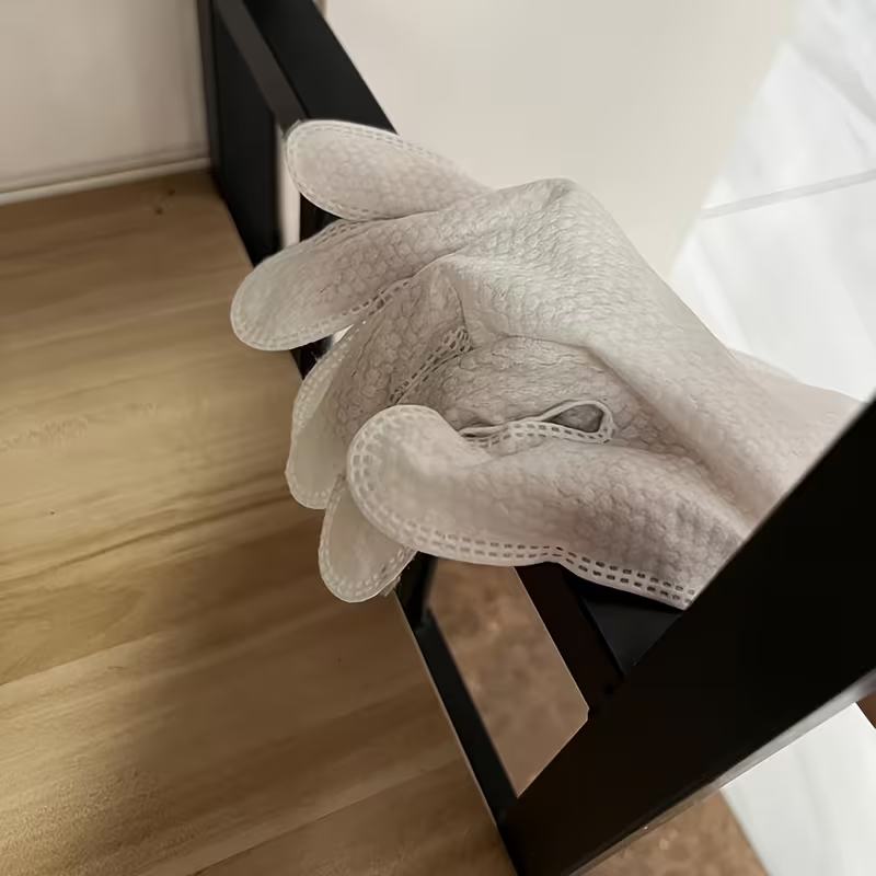 Disposable non-woven household dust removal gloves