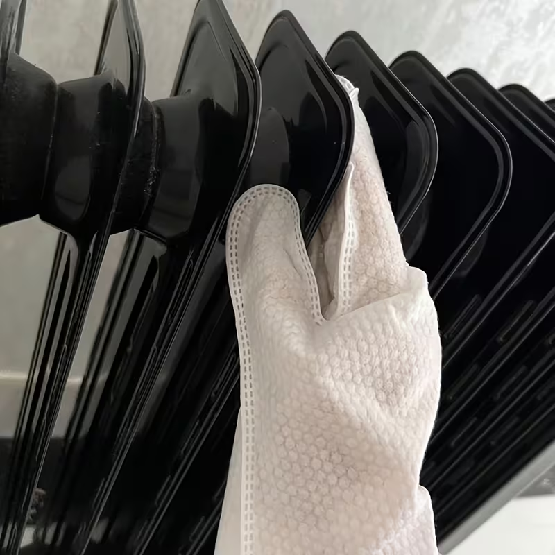Disposable non-woven household dust removal gloves