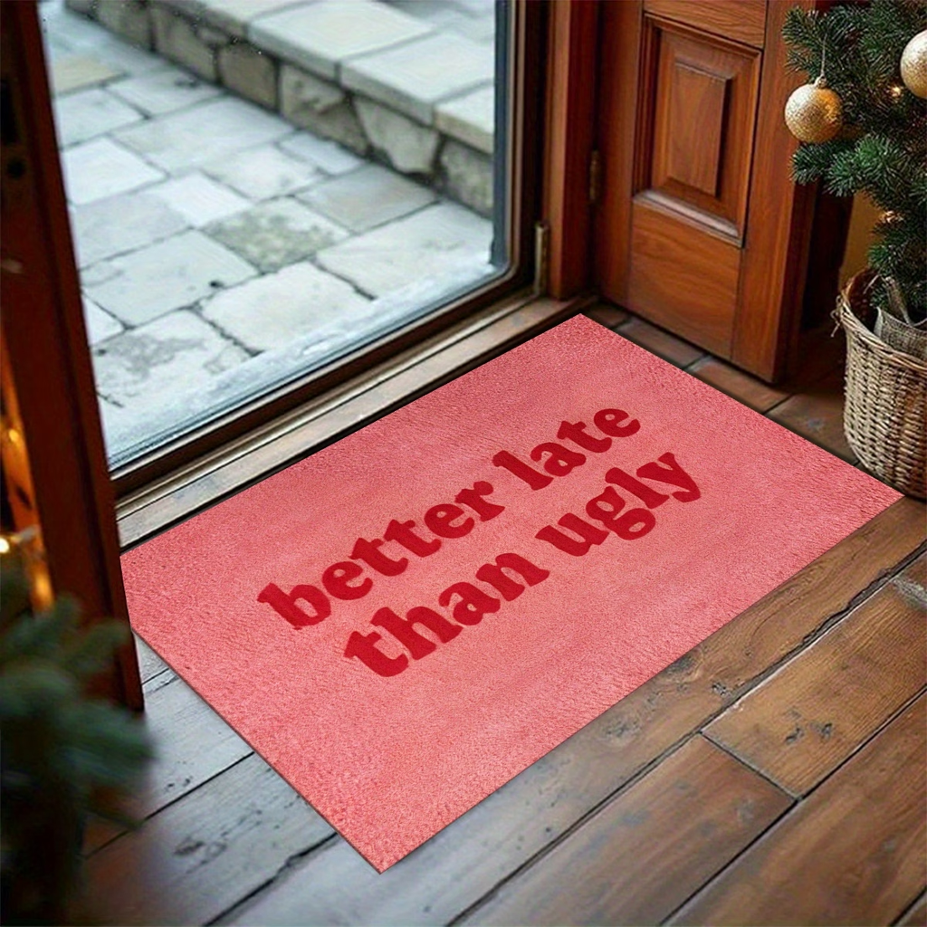 This stylish and fun "Better Late Than Ugly" printed felt floor mat