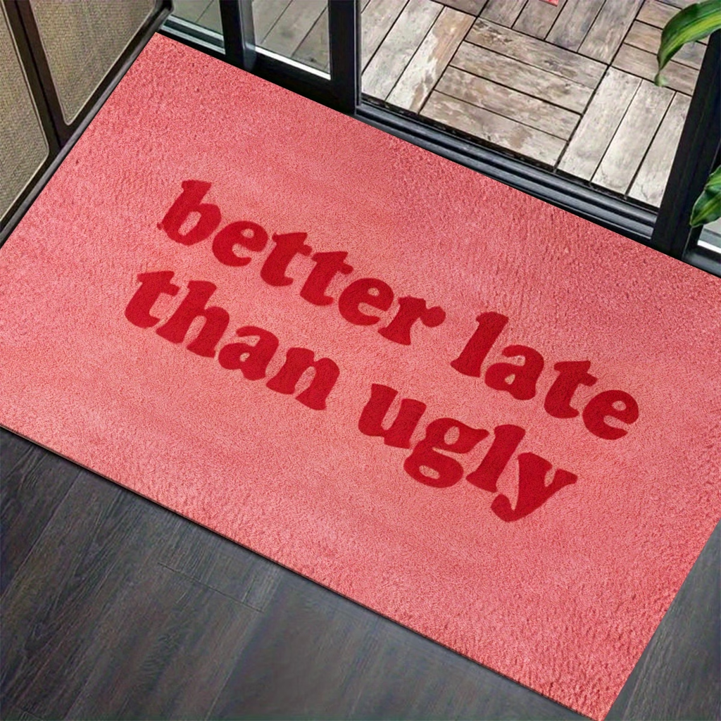 This stylish and fun "Better Late Than Ugly" printed felt floor mat