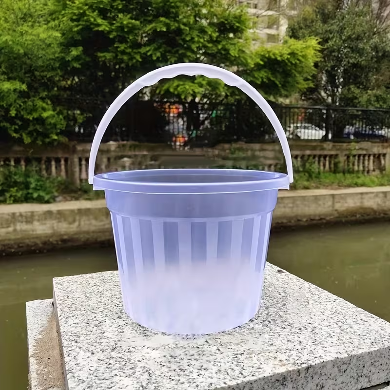 Two colorful, translucent mini buckets, handheld plastic buckets