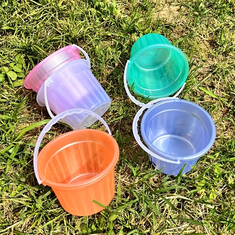 Two colorful, translucent mini buckets, handheld plastic buckets
